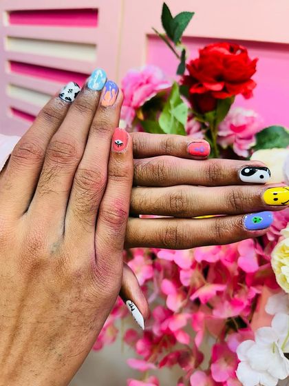 The random nail art set, showing how each nail is a mini masterpiece.