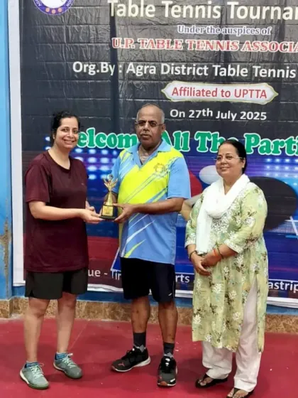 Jamini Goel receives her trophy for 3rd place in the Women's 39+ category, showcasing the success of our veterans' program.