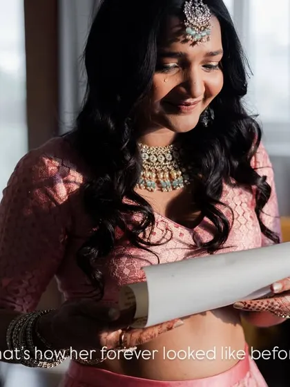 In that moment, reading his words, she knew exactly what her forever looked like before it even began. A beautiful, candid shot of a bride lost in a moment of love.