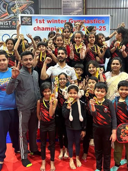 The entire team celebrating their success at the 1st Winter Gymnastics Championship. We win as a team.