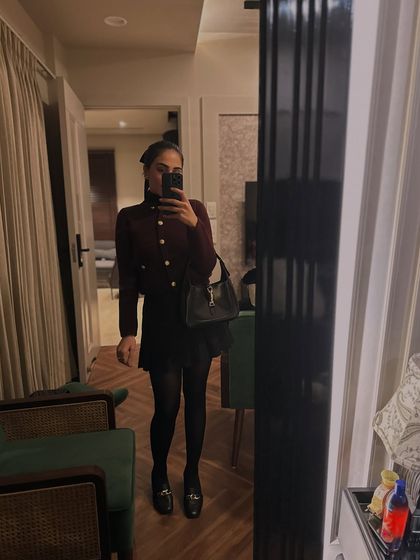 A preppy winter look with a cropped cardigan, skirt, and tights. This was a fun outfit for a chilly evening.