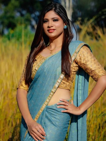 Another shot from the same outdoor series. The makeup is versatile enough to look stunning in different lighting conditions and poses, a key consideration for photoshoots.