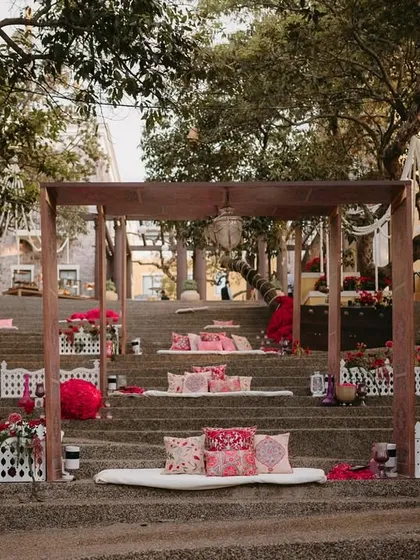 A full view of the unique tiered seating arrangement, creating a visually stunning and memorable lounge space for the Mehfil-e-Mehendi.