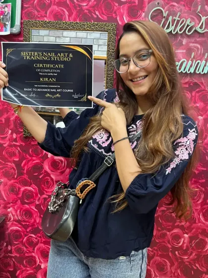 The proud smile of a newly certified nail artist! We are so happy for Kiran on successfully completing her nail art course. This certificate is the first step on her exciting new career journey.