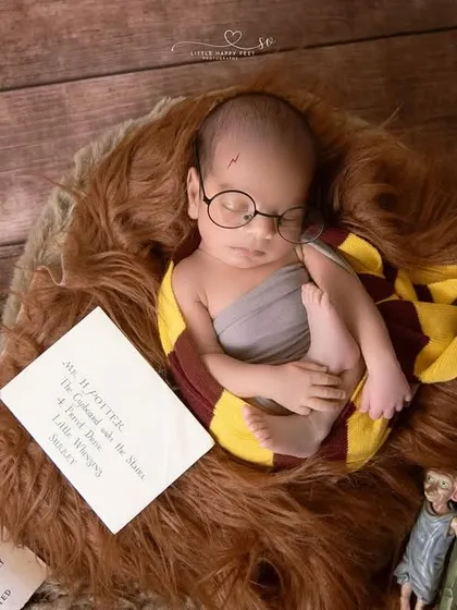 "You're a wizard, baby!" For the family that loves a good story, I offer creative themes like this Harry Potter setup. I have a wide range of props to bring your favorite fantasy worlds to life for your newborn's first portrait.