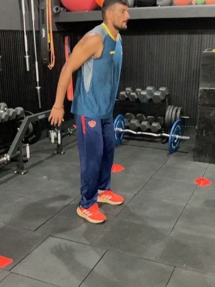 An athlete performing a depth jump. This advanced plyometric drill improves reactive strength by minimizing ground contact time and maximizing vertical jump height, a key indicator of explosive power.