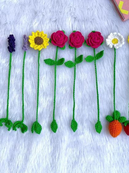 A lineup of all the different flower and fruit bookmarks I made. Seeing them all together shows the beautiful variety of designs available.