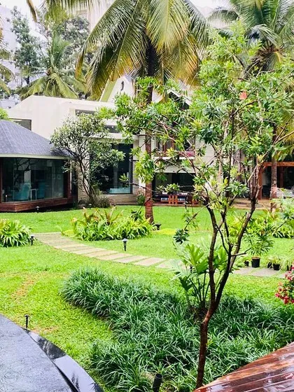 Our work extends beyond the water's edge. This project demonstrates how we design and execute a complete landscape, integrating water bodies, lush lawns, stone pathways, and mature planting to create a cohesive and immersive natural environment.