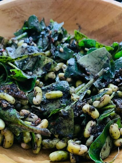 Here I've mixed green soya beans with fermented crab to make a chutney. The fresh beans, pungent crab, king chilli, and herbs create a complex and delicious side dish.