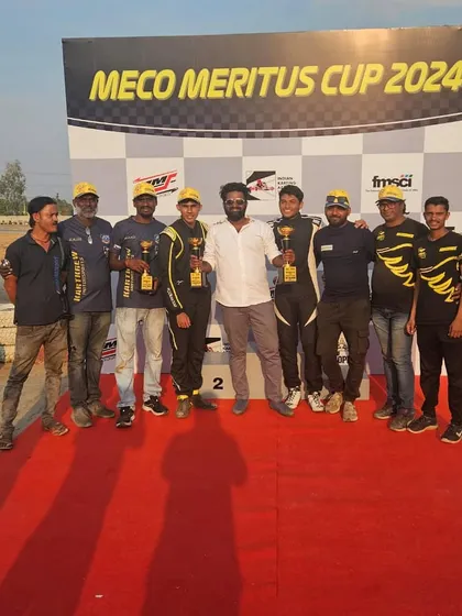 The team celebrating a double podium finish at the Meco Meritus Cup.