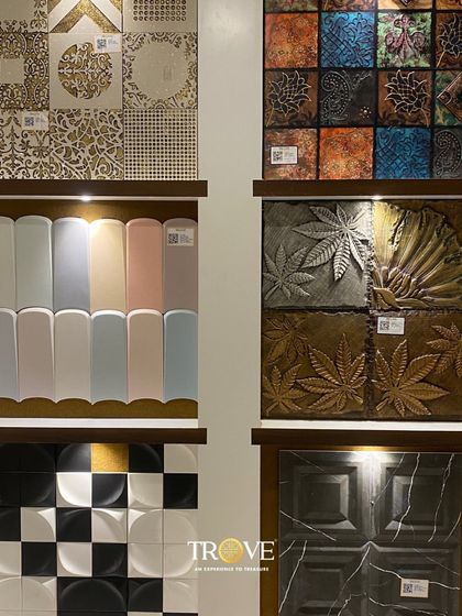 Every piece tells a story of craftsmanship. This display features a mix of styles, from classic patterns and pastel subway tiles to bold checkered designs and nature inspired reliefs.
