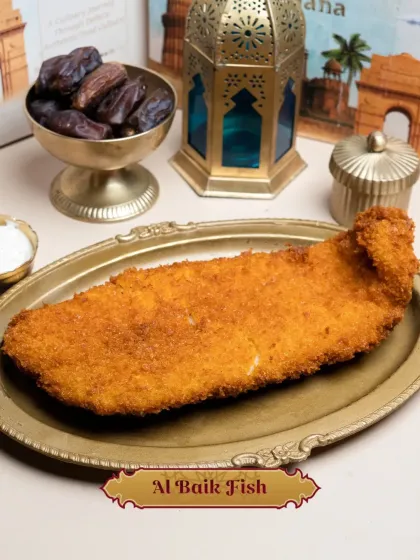 Crispy Al Baik Fish, a golden fried fish fillet coated in famous Al Baik crumbs, is one of the delicious starters in our Iftar menu.