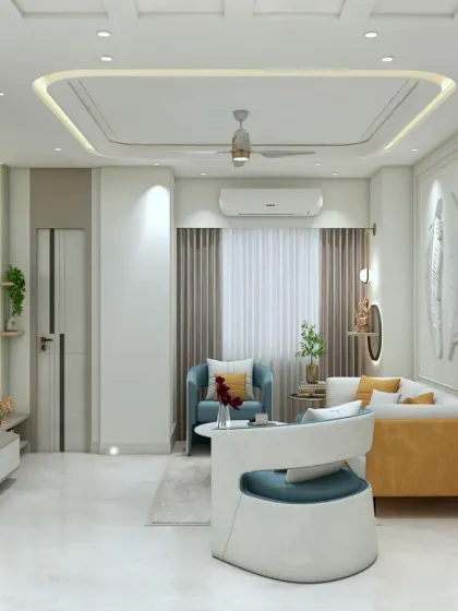 Another angle of the living room, showing the comfortable seating arrangement and the view towards the TV unit. The design is perfect for a family that loves to relax together.