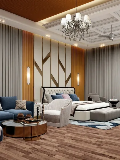 This master bedroom suite is designed as a complete personal haven, combining sleeping quarters with a comfortable lounge area. The design features a striking wood and gold accent wall, a classic coffered ceiling, and a crystal chandelier, blending modern luxury with timeless comfort.