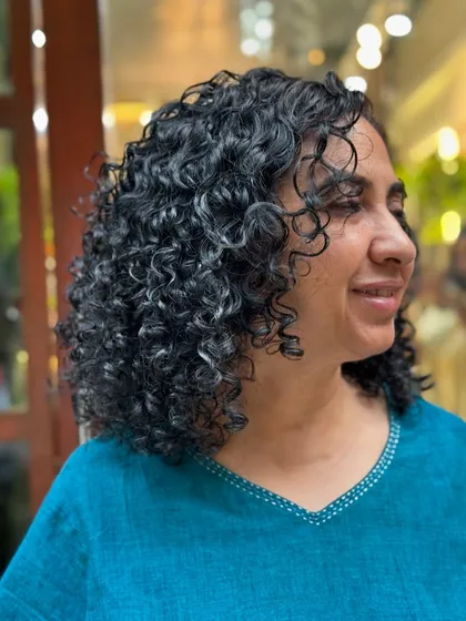 More examples of my short curly haircuts, from bobs to layered chops, each one personalized to the client's curl pattern and face shape.