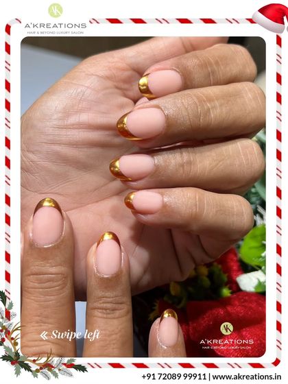 Another perspective on the elegant gold-tipped French manicure, perfect for festive occasions or adding a touch of glamour to your everyday look.