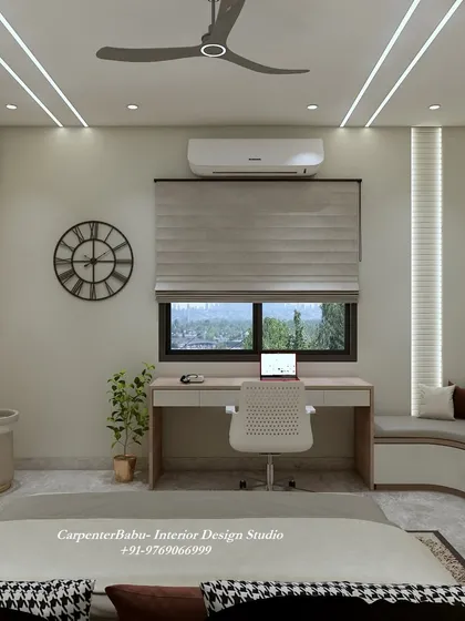 A guest bedroom with a light, feminine touch. The design includes a comfortable seating area, a functional desk, and a beautiful upholstered headboard.