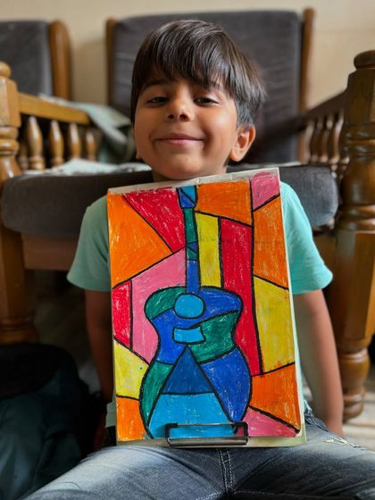 This student's abstract guitar drawing is a fantastic exploration of colour and shape. I encourage students to experiment with different styles, like this piece inspired by Cubism.