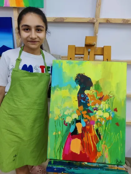 The creation of a colorful, abstract silhouette painting, showing the process of layering bright acrylics to create a stunning final piece.