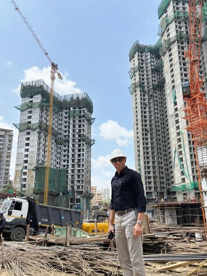 Here I am on-site at a high-rise township project in Mumbai, overseeing the construction of these complex towers.