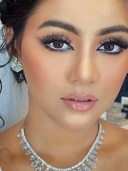 Let your eyes do all the talking with this dramatic Arabic-inspired bridal look. The sharp winged liner, bright waterline, and full volume lashes create an unforgettable, high-impact style perfect for a bride who wants to make a statement.