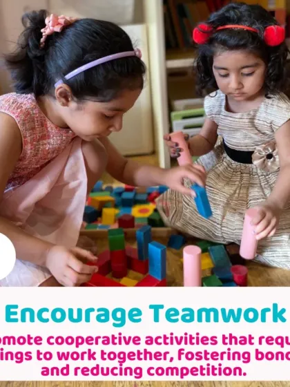 Two girls learning to share and build together with blocks. This kind of cooperative play is a great way to handle sibling rivalry and encourage teamwork.