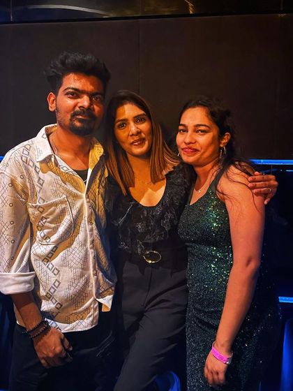 Posing with friends and guests during our New Year's Eve 2024 celebration. It's all about creating a fun and welcoming atmosphere.