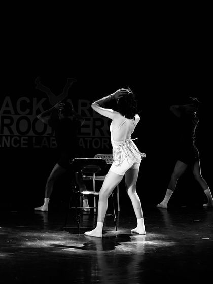 The silhouette of a dancer telling a story. There's something timeless and classic about a jazz performance captured in black and white.