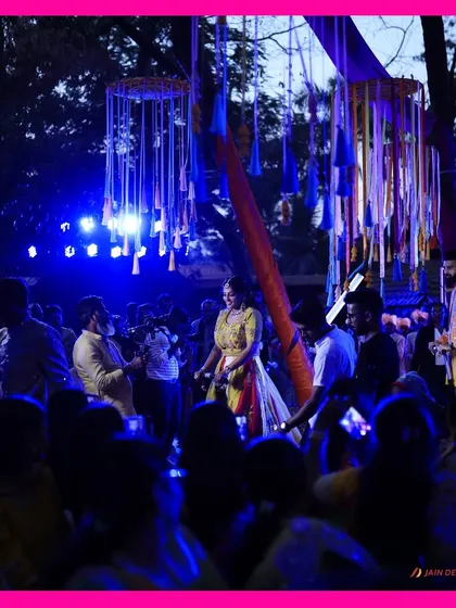 The bride and groom enjoying a neon rain dance at their Haldi party. This fun and unique concept shows my ability to create truly memorable and out-of-the-box experiences.