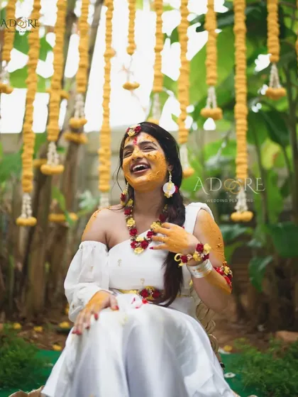 Pure joy during a vibrant Haldi ceremony. We design these pre-wedding events to be full of fun and laughter, with beautiful decor like this 'Yellow Land' theme that creates the perfect backdrop for happy memories.