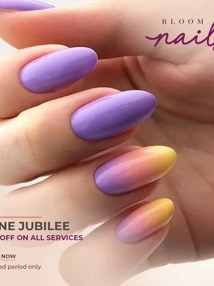 A beautiful combination of solid lilac and a warm sunset ombré on almond-shaped nails.