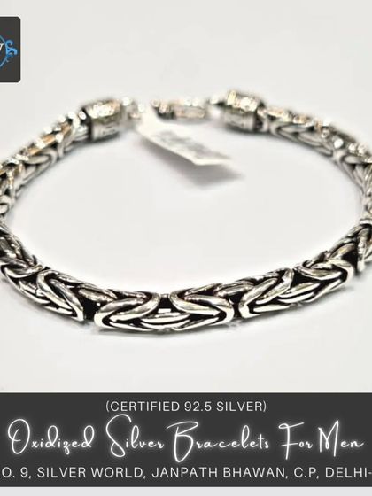 An oxidized Byzantine or 'King's Chain' style bracelet. The darkened silver enhances the depth and complexity of the pattern, making it a true statement piece.
