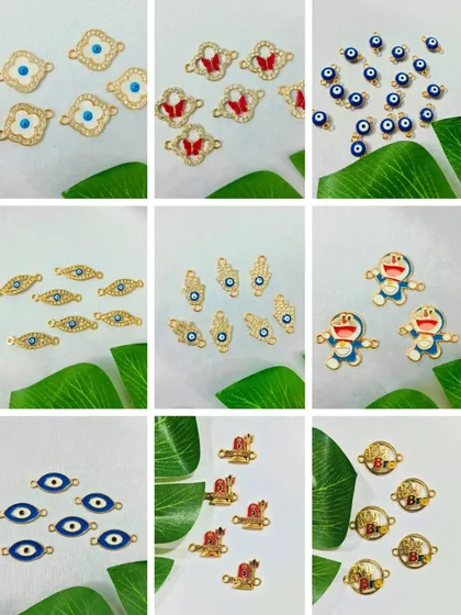 Add a trendy touch to your Rakhis with our collection of charms. This image shows various designs, including evil eye, hamsa hand, and even cute Doraemon charms.