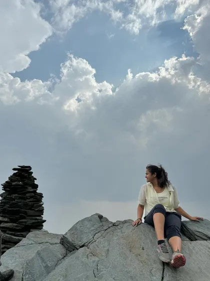 Sitting on a rock and gazing at the cloudy sky. Immersing myself in nature is the best way to reset my mind and soul.