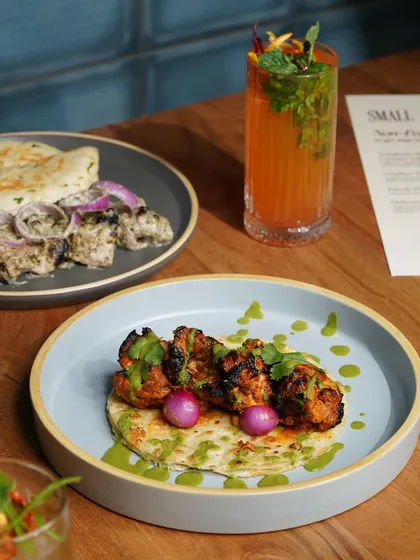 For restaurants, the photo is the first taste. I style and shoot menu items like this vibrant chicken tikka to highlight every detail, from the char on the meat to the fresh garnish, ensuring the dish looks irresistible to customers.