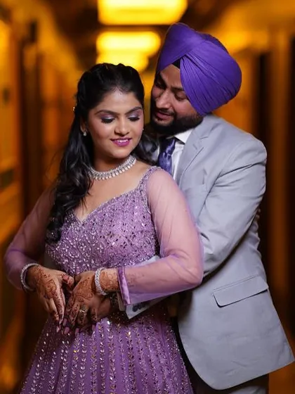 A sweet moment between the couple. The bride's glam makeup and the groom's sharp look made them a stunning pair on their engagement day.