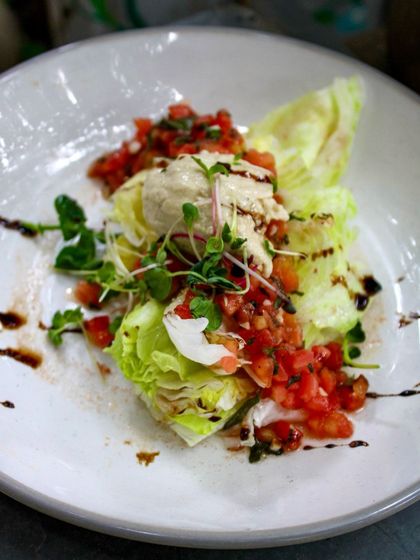 A refreshing and crisp option, our Iceberg Wedges Salad features our signature vegan burrata cheese and a zesty tomato salsa. Each bite is a symphony of deliciously healthy flavors.
