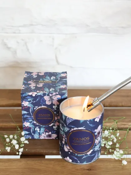 Lighting one of our floral-printed scented candles. Each one comes in a beautiful matching box, making it a perfect gift that’s ready to give.