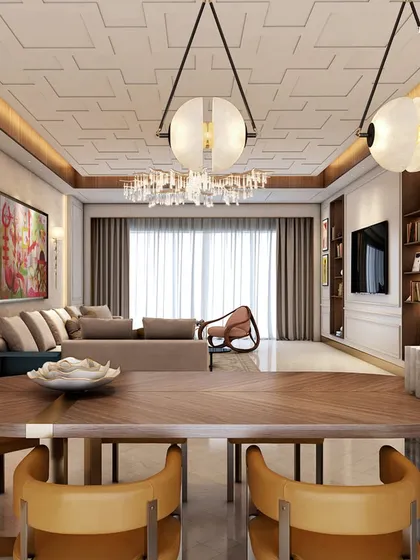 In this 15,000 sq. ft. Parisian-style apartment, the family room embodies both opulence and calm. Designed for a millennial couple, the space blends chic French mouldings with modern furniture and Indian art, creating a symphony of styles that is both timeless and on-trend.