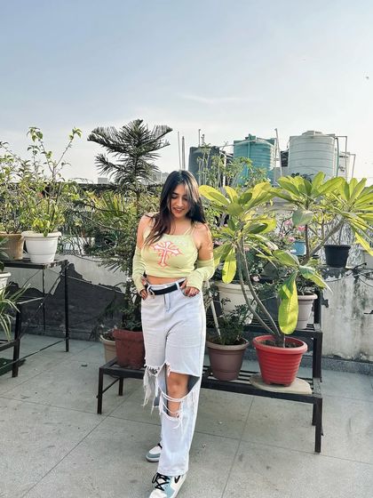 A full-length shot of a trendy Myntra outfit. I make sure to include product details and discount codes to make shopping easy for my followers.