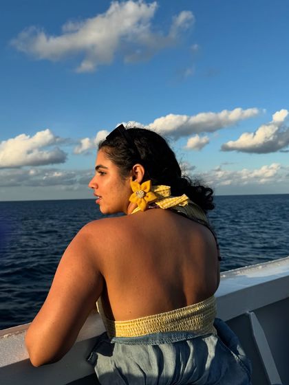 A back view, showing off the open-back design of my top and the beautiful ocean view.