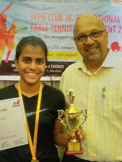 A close-up of our champion, Manasi Jare, with her trophy. We celebrate her dedication and success.