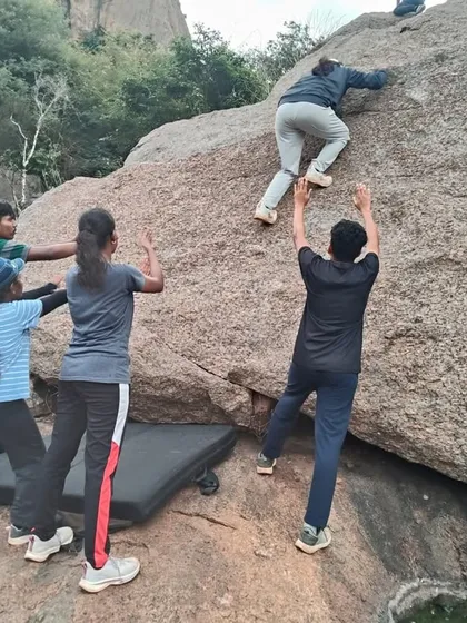 Bouldering is all about problem-solving, strength, and teamwork. Here, participants in our orientation course learn how to spot each other, building trust and camaraderie as they tackle challenges together on the rocks of Ramanagara.