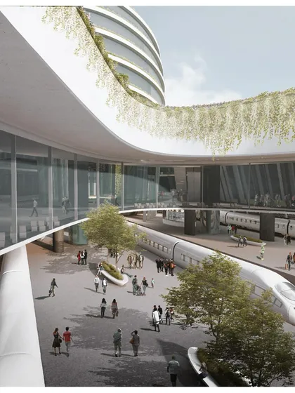 A view from the platform level, looking up at the open green courtyards and cascading greenery. This design ensures natural light and ventilation reach the platforms, improving the passenger experience.