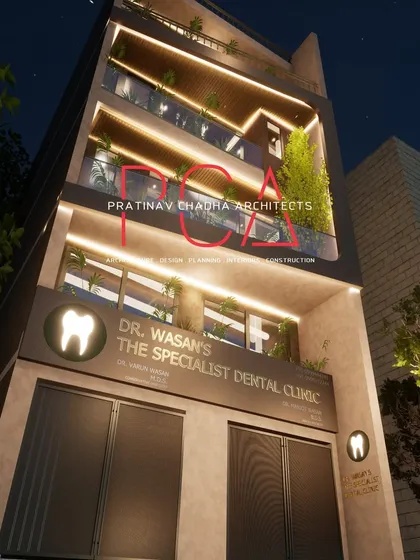 A close-up, low-angle render of the Mukherjee Nagar facade at night. This view highlights the textures and lighting details around the dental clinic entrance.