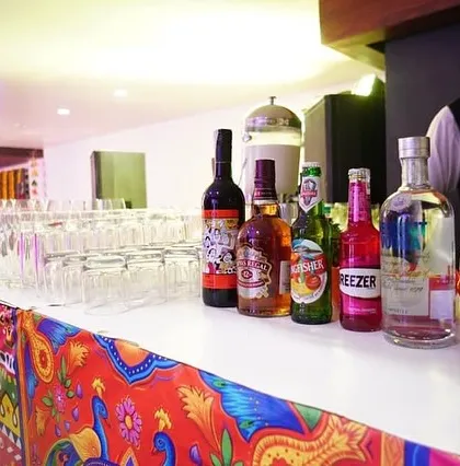 A fully stocked bar for a Lohri party. We can arrange for bar services, ensuring your guests have a wide selection of drinks to enjoy throughout the celebration.