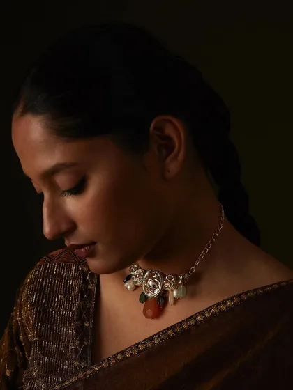 A profile shot highlighting a beautiful necklace from Mohher India, which we paired with the outfits for this shoot.
