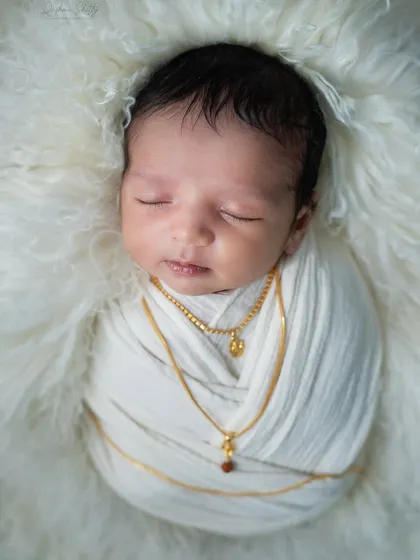 Even a boss needs his rest. A peaceful, sleeping shot that still carries the theme with the tiny gold chains.
