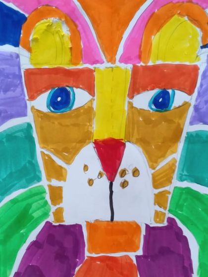 This vibrant, abstract cat face uses bold color blocking inspired by artists like Piet Mondrian, introducing students to different art styles.
