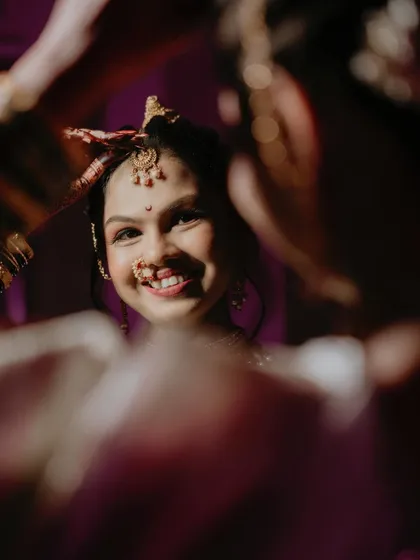 The pure, unscripted joy of a bride on her special day. This candid bridal portrait is what I love to capture. It’s that beautiful, in-between moment, full of happiness and anticipation, that tells a truer story than any posed photograph.
